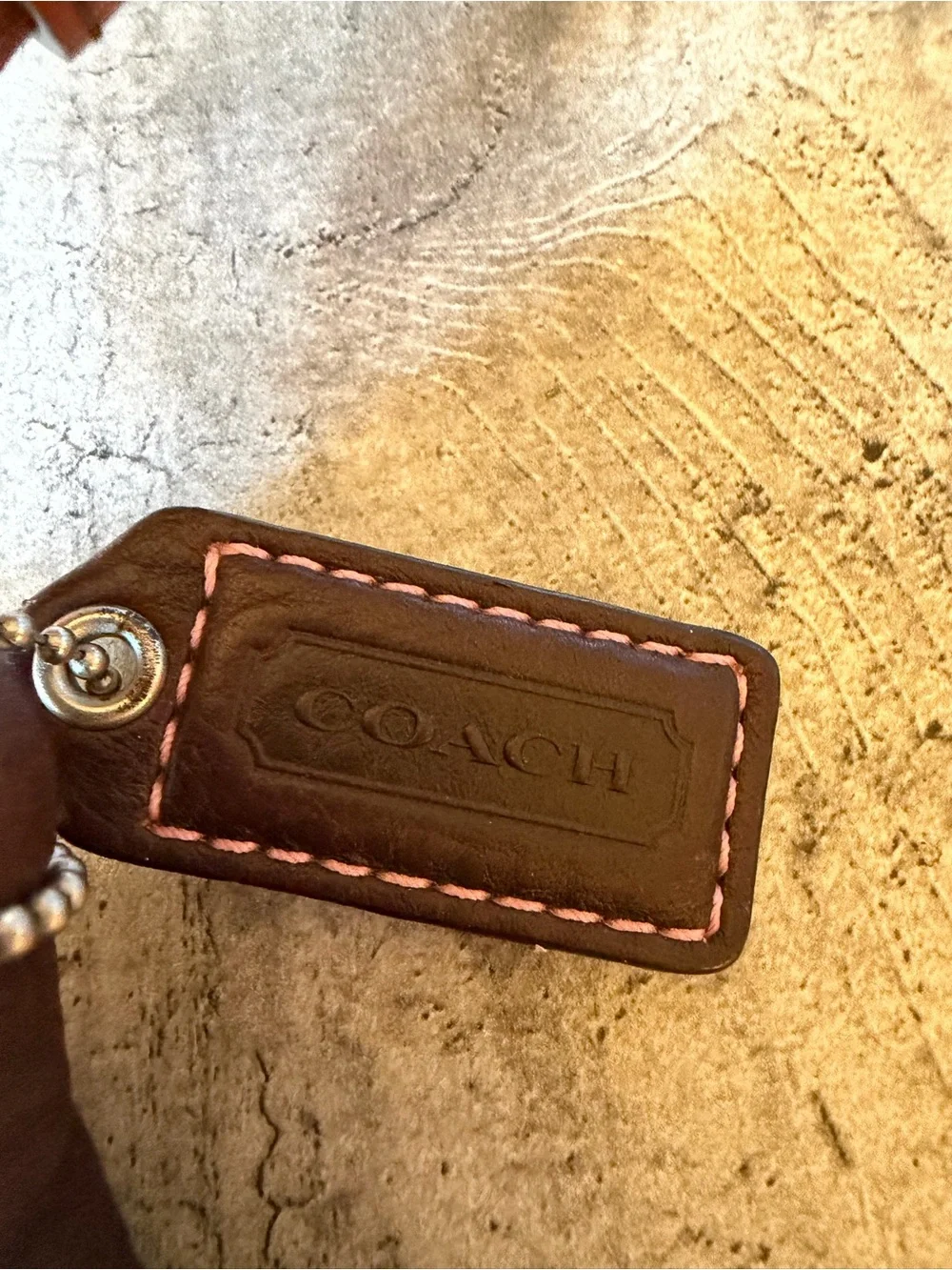 Coach Brown Leather Shoulder Bag with Tan Strap and Pink Topstitching